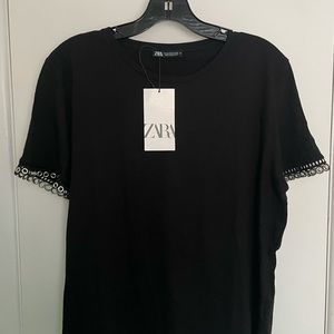Zara shirt with contrasting rings on the sleeves